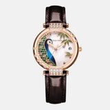    Montre femme acier inoxydable et doré boitier rond représente la tête d'un paon magnifique bracelet acier doré et cuir couleur aubergine 